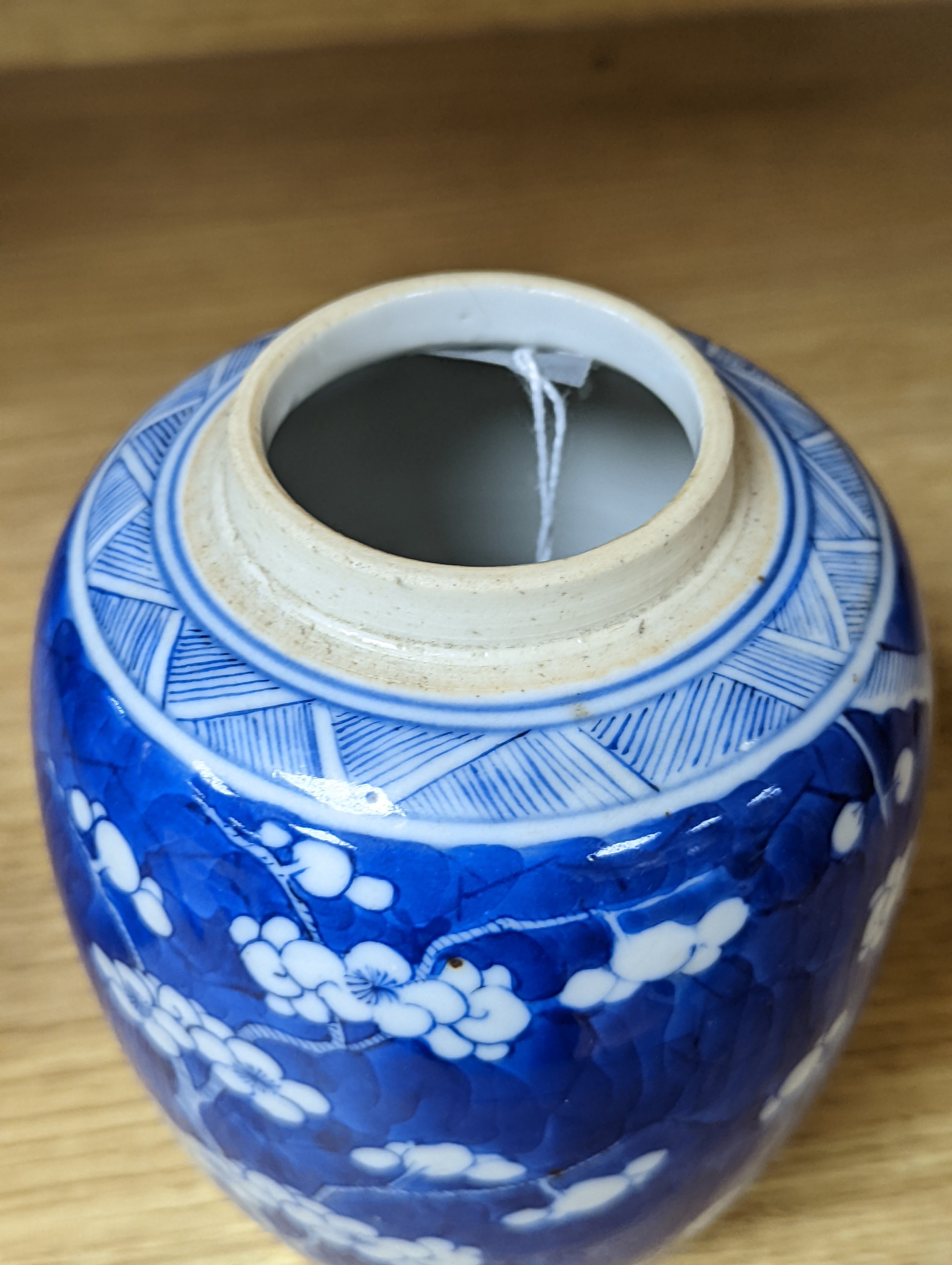 A 19th century Chinese blue and white prunus jar 13.5cm